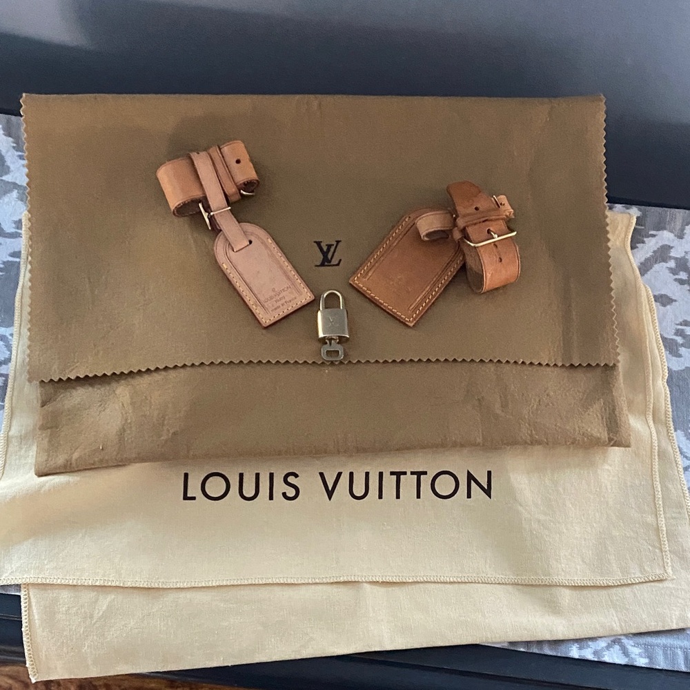 Louis Vuitton Set Includes: 2 Dust Bags, 2 Luggage Tags and Lock & Key #302
